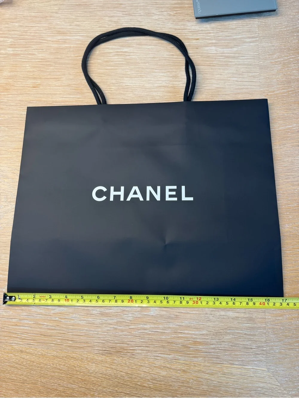 CHANEL Black Shopping Bag with White Camellia Logo